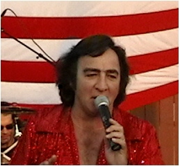 Neil Diamond impersonator performs America with his tribute band.