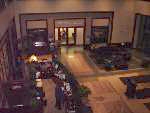 The lobby of the Embassy Suites in Rosemont, Illinois is quiet on Saturday night. Nearly everyone is at the Neil Diamond Birthday Party around the corner and down the hall....except for TomZ who is seen posting to iaisnd.com that Lois lost her halo! PHOTO: Sadge